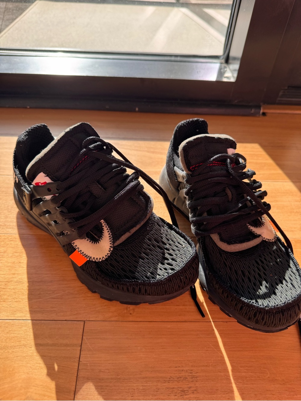 Nike Black Sneakers with Small Orange Accent